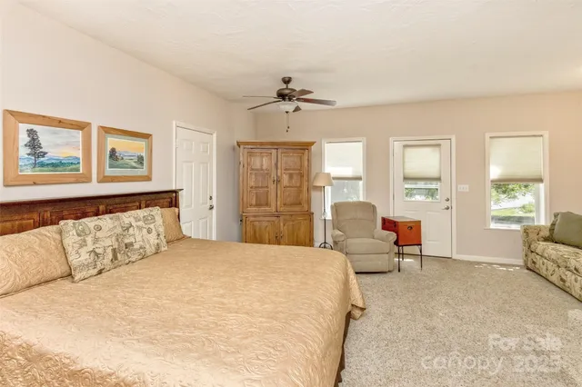 a bed room with a bed and furniture