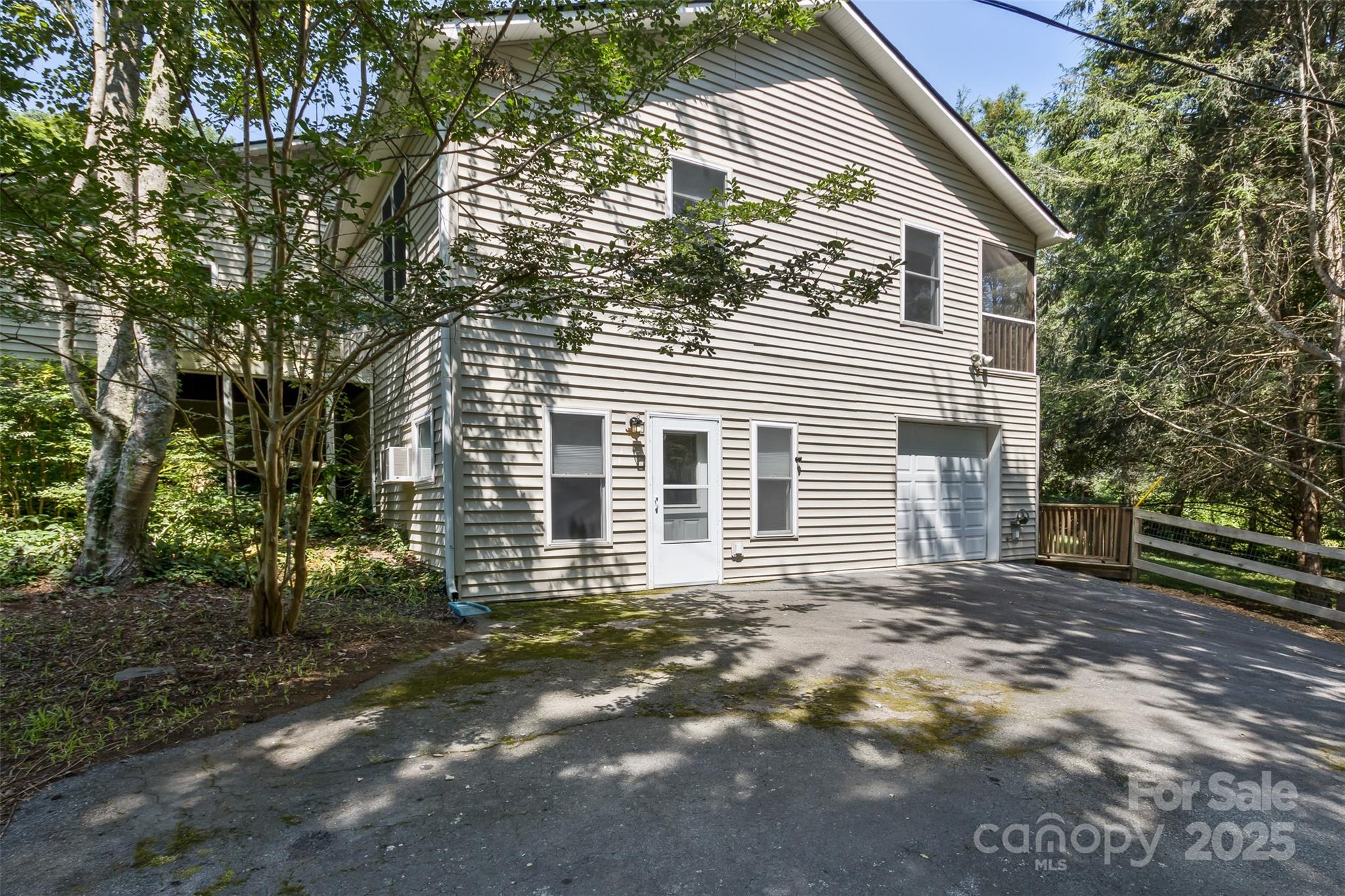 15 Beaverdam Knoll Road Asheville, NC 28804 - Photo 31 of 39 a view of a house with a yard