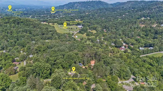 a view of roof deck with wooden floor and seating space