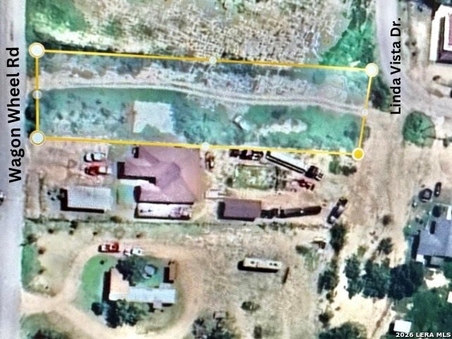 1881 Wagon Wheel Road Eagle Pass, TX 78852 - Photo 2 of 4 an aerial view of residential houses with outdoor space