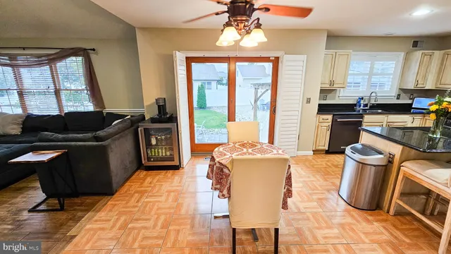 a kitchen with a stove a sink and a refrigerator