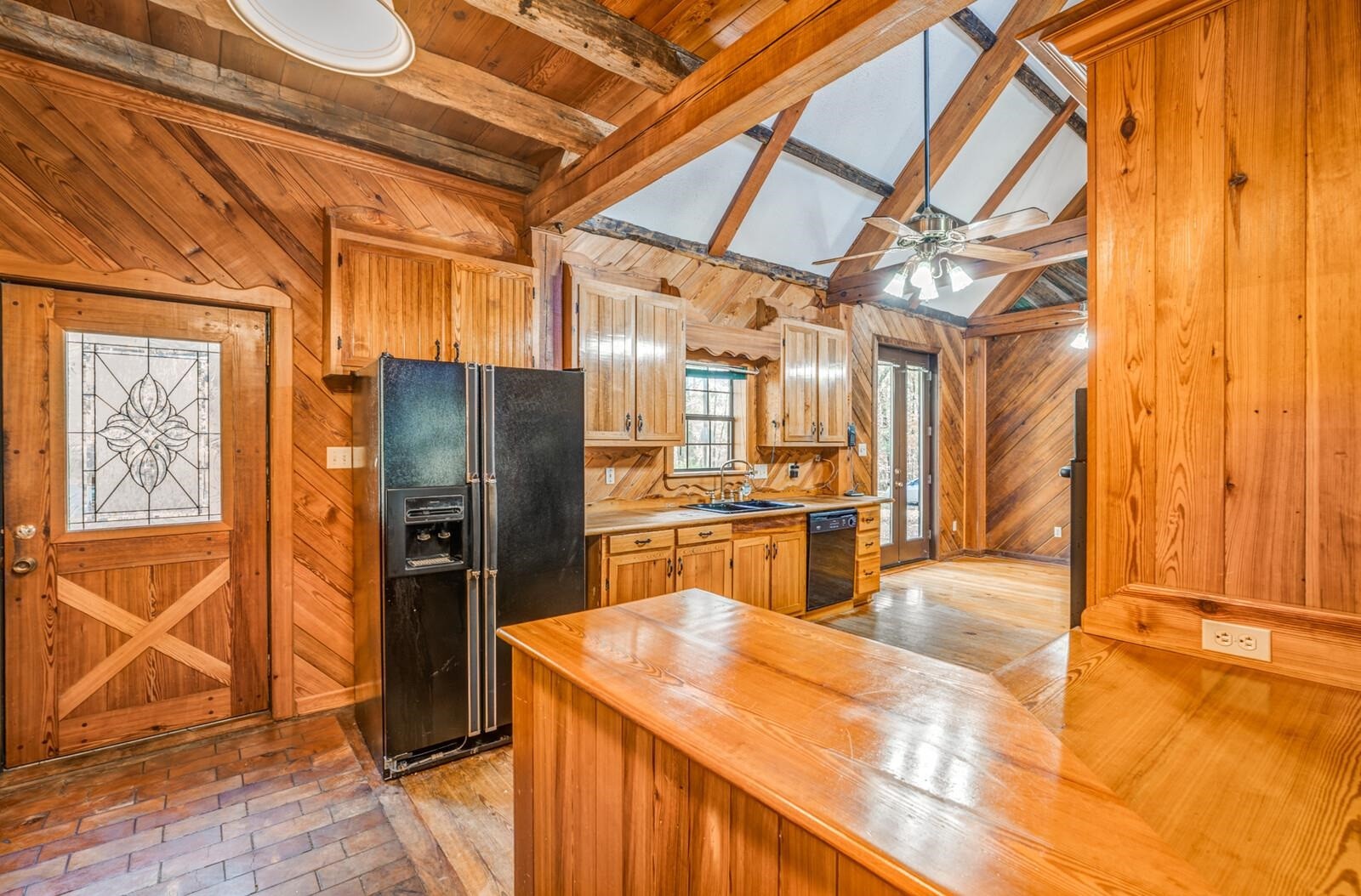 4626 Billy Maher Road Memphis, TN 38135 - Photo 18 of 35 a kitchen with stainless steel appliances kitchen island granite countertop a refrigerator and a cabinets