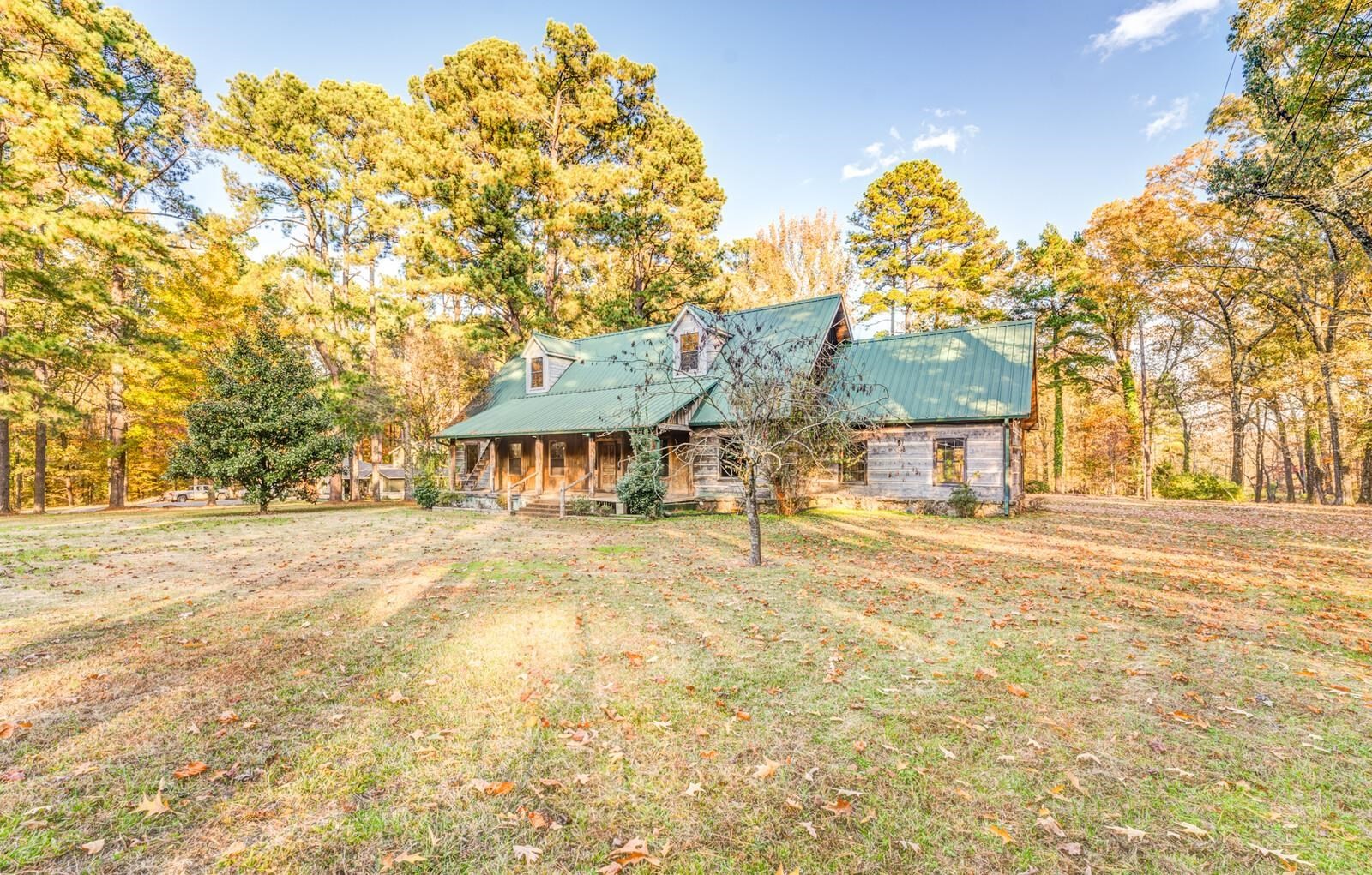 4626 Billy Maher Road Memphis, TN 38135 - Photo 2 of 35 a front view of a house with a yard and garage