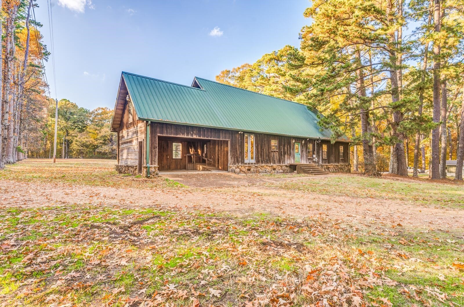 4626 Billy Maher Road Memphis, TN 38135 - Photo 9 of 35 a front view of a house with a yard