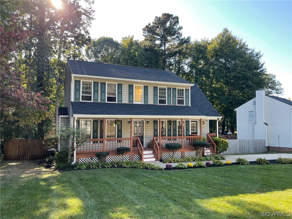 8130 Preakness Court Midlothian, VA 23112 - Photo 2 of 29 a front view of a house with a garden