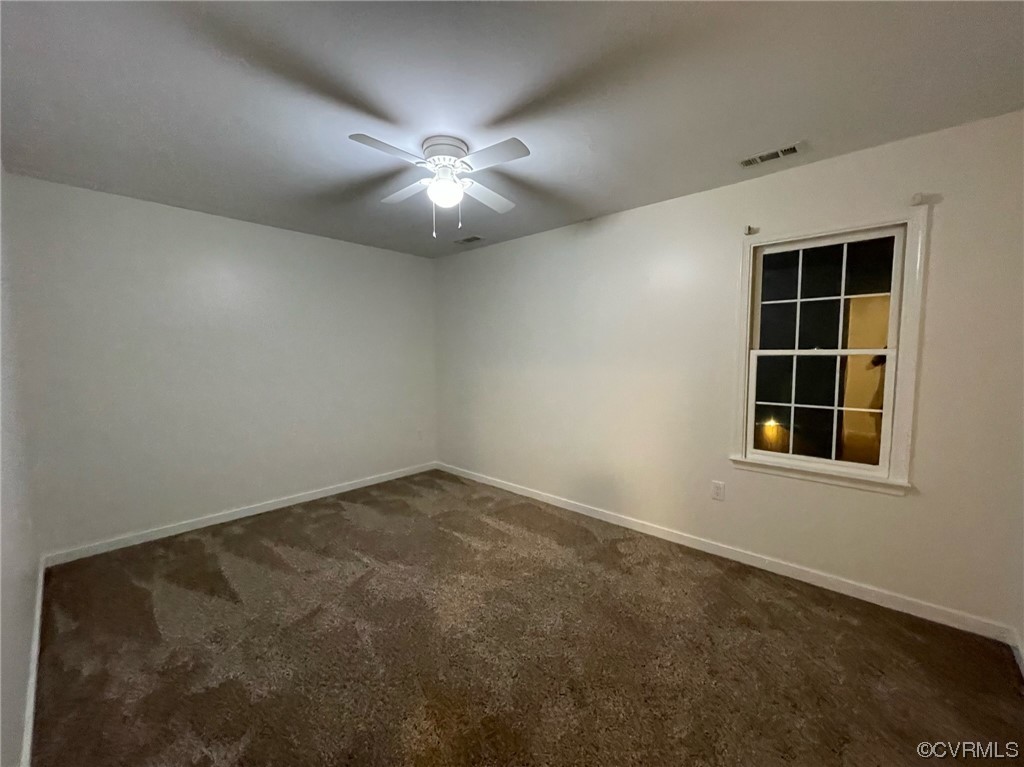 8130 Preakness Court Midlothian, VA 23112 - Photo 21 of 29 an empty room with windows and fan