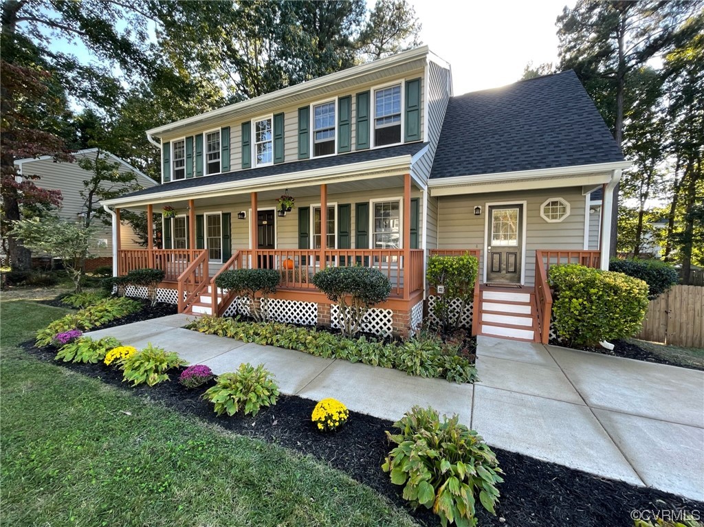 8130 Preakness Court Midlothian, VA 23112 - Photo 3 of 29 a front view of a house with garden