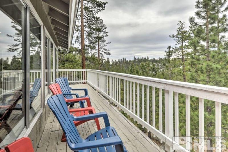 321 Barton Drive Stateline, NV 89449 - Photo 20 of 23 a balcony with wooden floor and outdoor seating