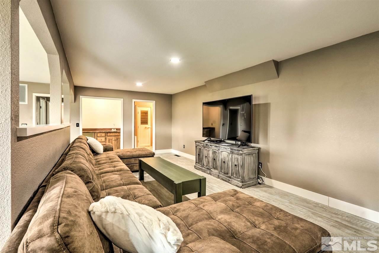 321 Barton Drive Stateline, NV 89449 - Photo 7 of 23 a living room with furniture and a flat screen tv