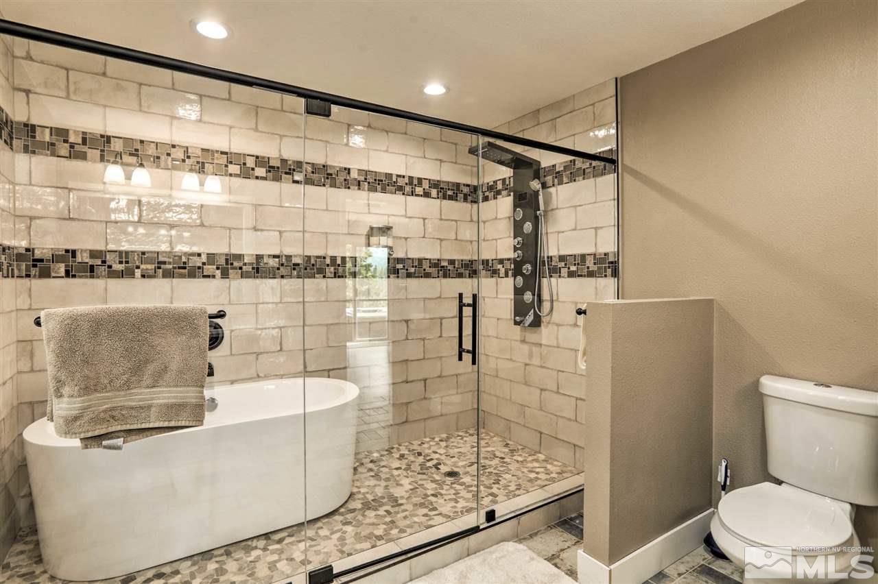 321 Barton Drive Stateline, NV 89449 - Photo 10 of 23 a bathroom with a bathtub and shower