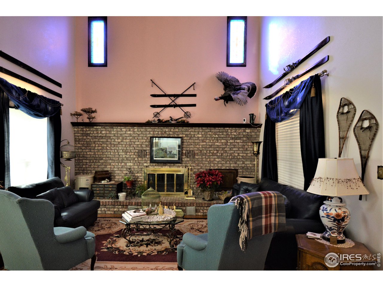 12031 Co Road Weldona, CO 80653 - Photo 4 of 40 Living Room with Fireplace