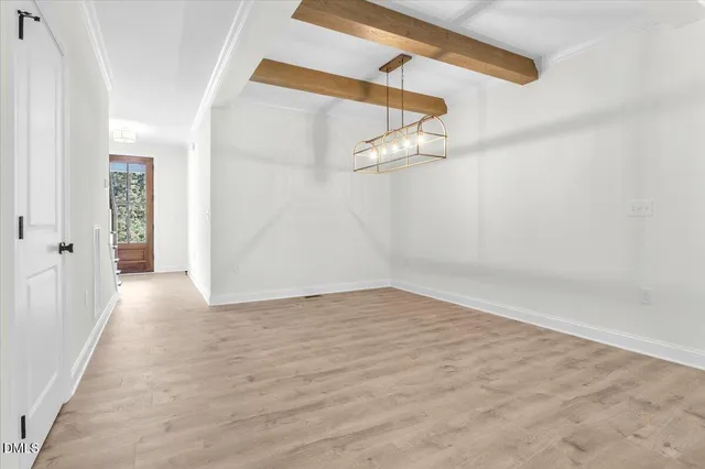 a bathroom with a bathtub sink and mirror