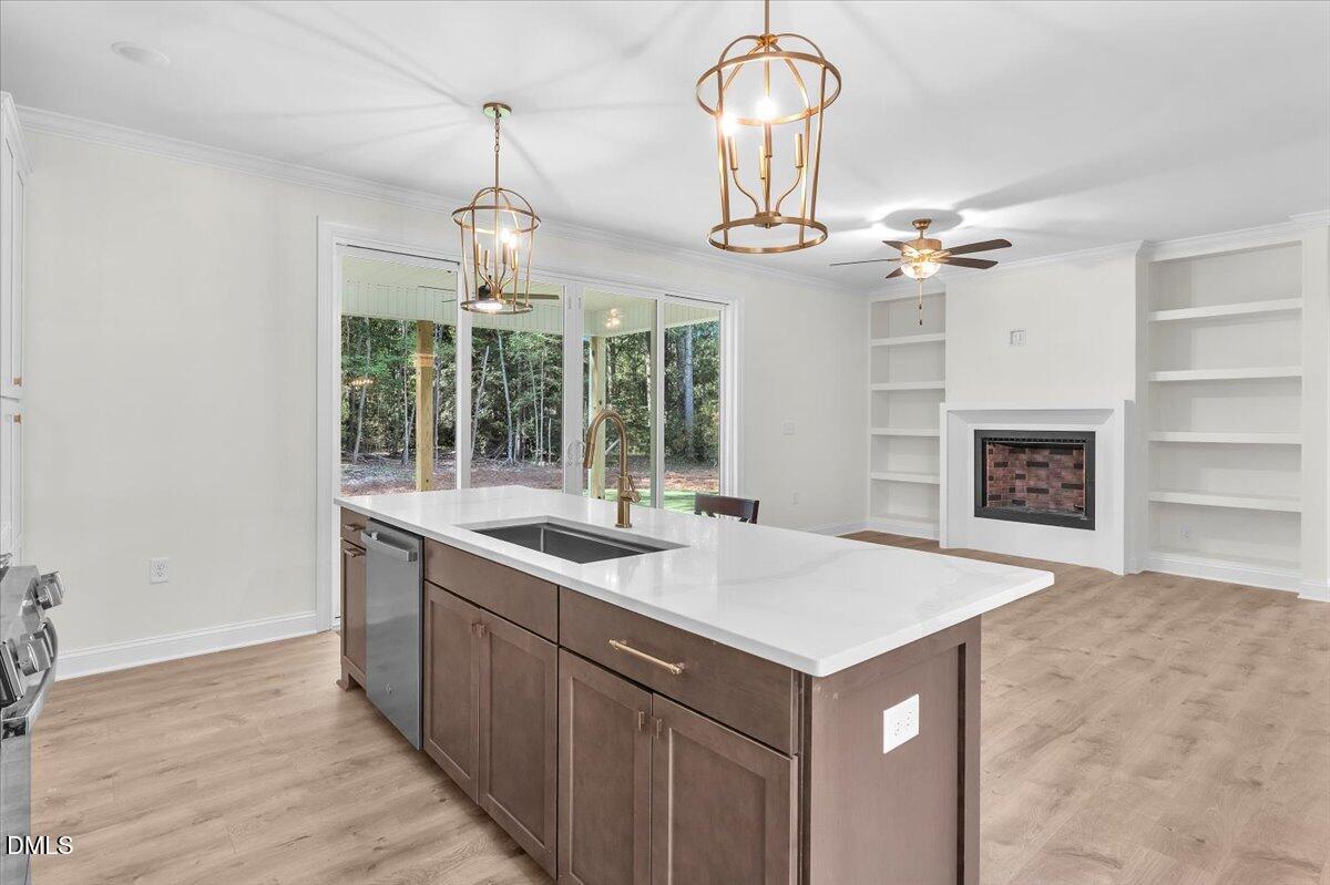 12845 Mallard Rock Road Zebulon, NC 27597 - Photo 26 of 63 a very nice looking room with a chandelier