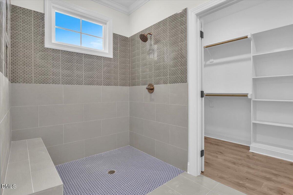 12845 Mallard Rock Road Zebulon, NC 27597 - Photo 42 of 63 a bathroom with a shower