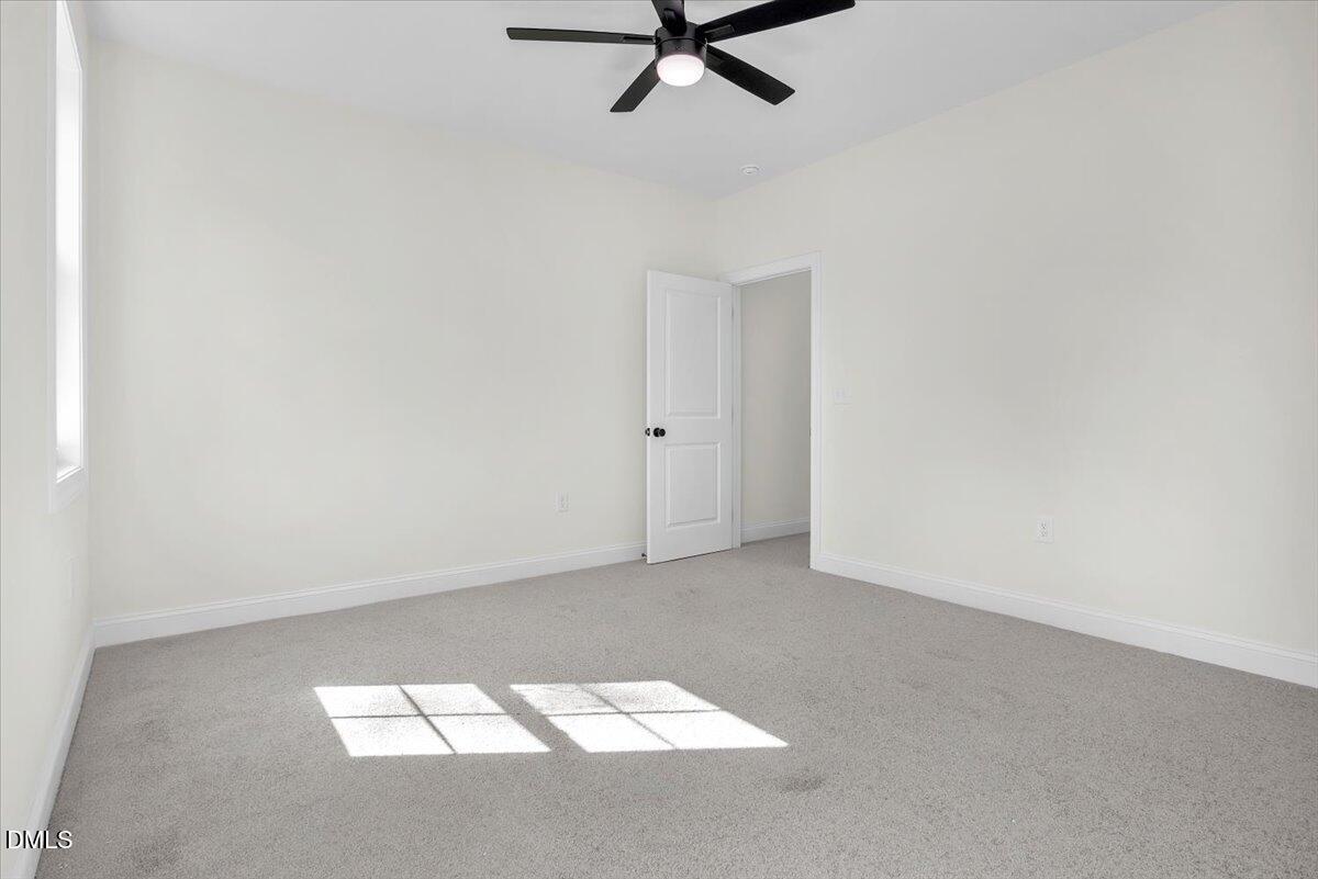 12845 Mallard Rock Road Zebulon, NC 27597 - Photo 51 of 63 an empty room