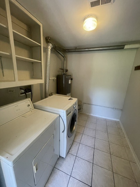 1590 Perry Court, Unit A Aurora, IL 60505 - Photo 17 of 17 a utility room with dryer and washer