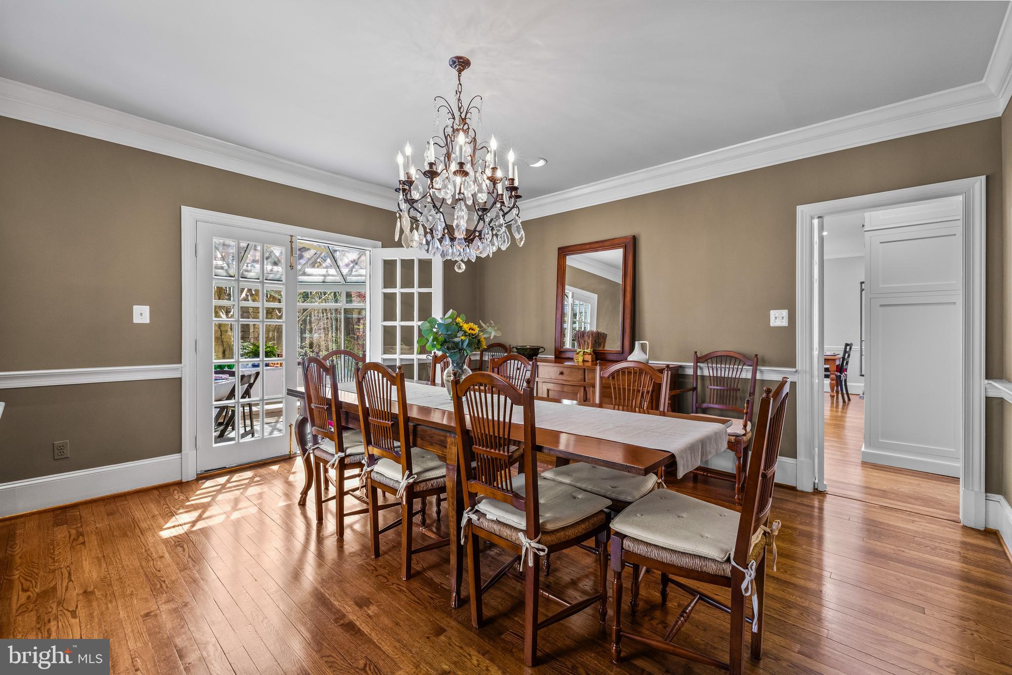 901 Chestnut Ridge Drive Lutherville-Timonium, MD 21093 - Photo 18 of 138 a view of a dining room with furniture wooden floor and chandelier