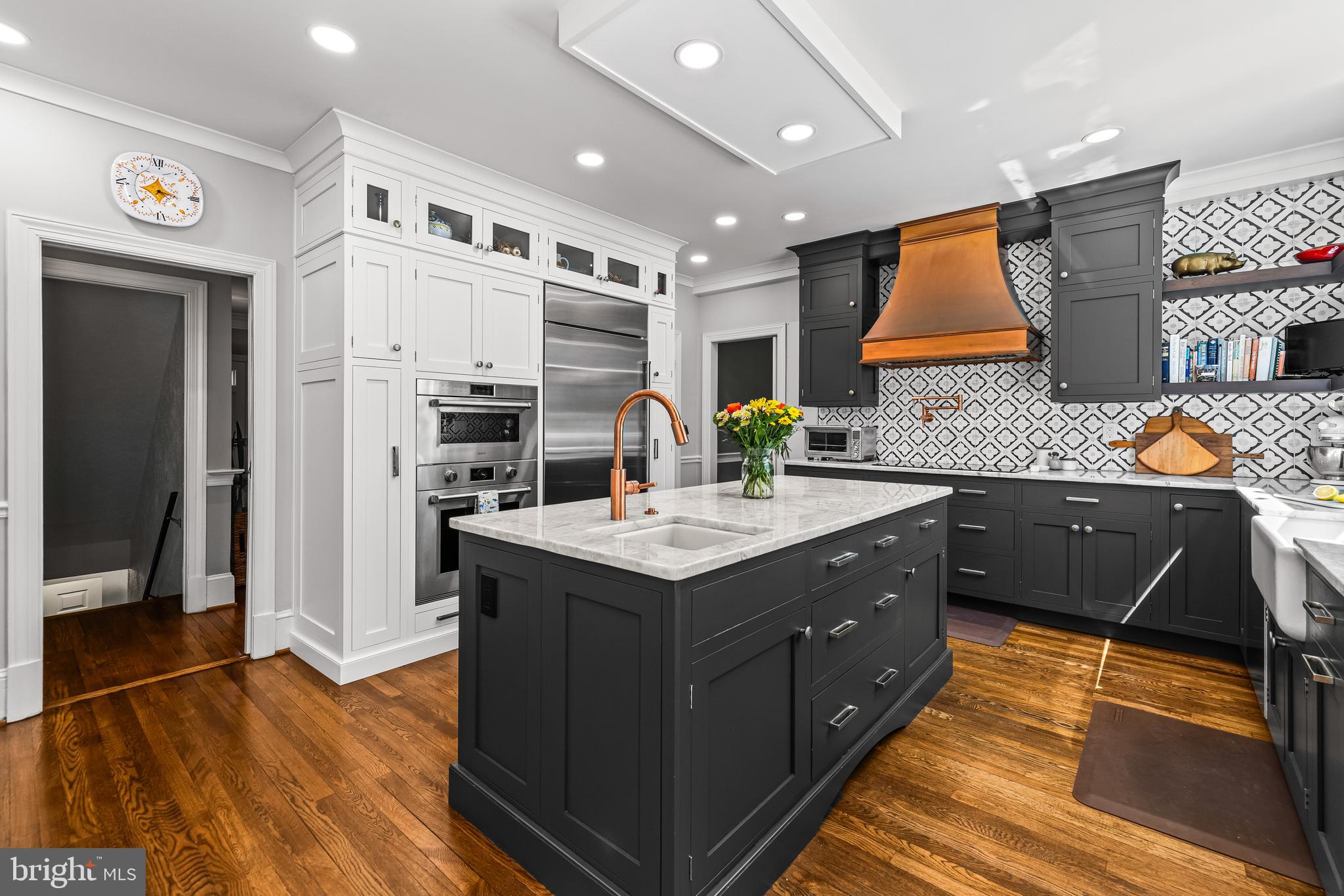 901 Chestnut Ridge Drive Lutherville-Timonium, MD 21093 - Photo 29 of 138 a kitchen with stainless steel appliances granite countertop a stove and a sink