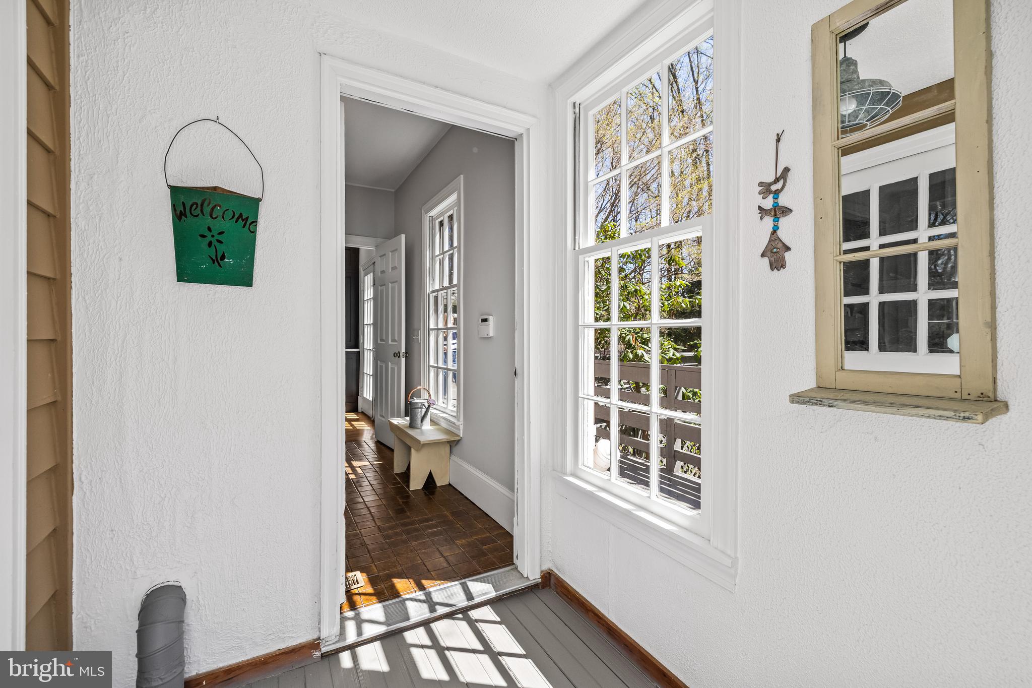 901 Chestnut Ridge Drive Lutherville-Timonium, MD 21093 - Photo 45 of 138 a view of an entryway with wooden floor and a livingroom