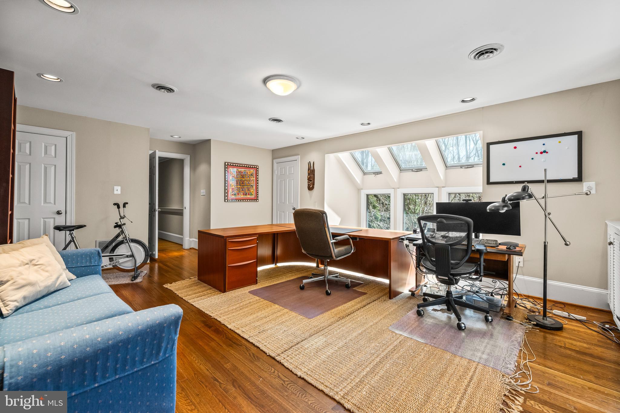 901 Chestnut Ridge Drive Lutherville-Timonium, MD 21093 - Photo 63 of 138 a view of a livingroom with workspace and a couch