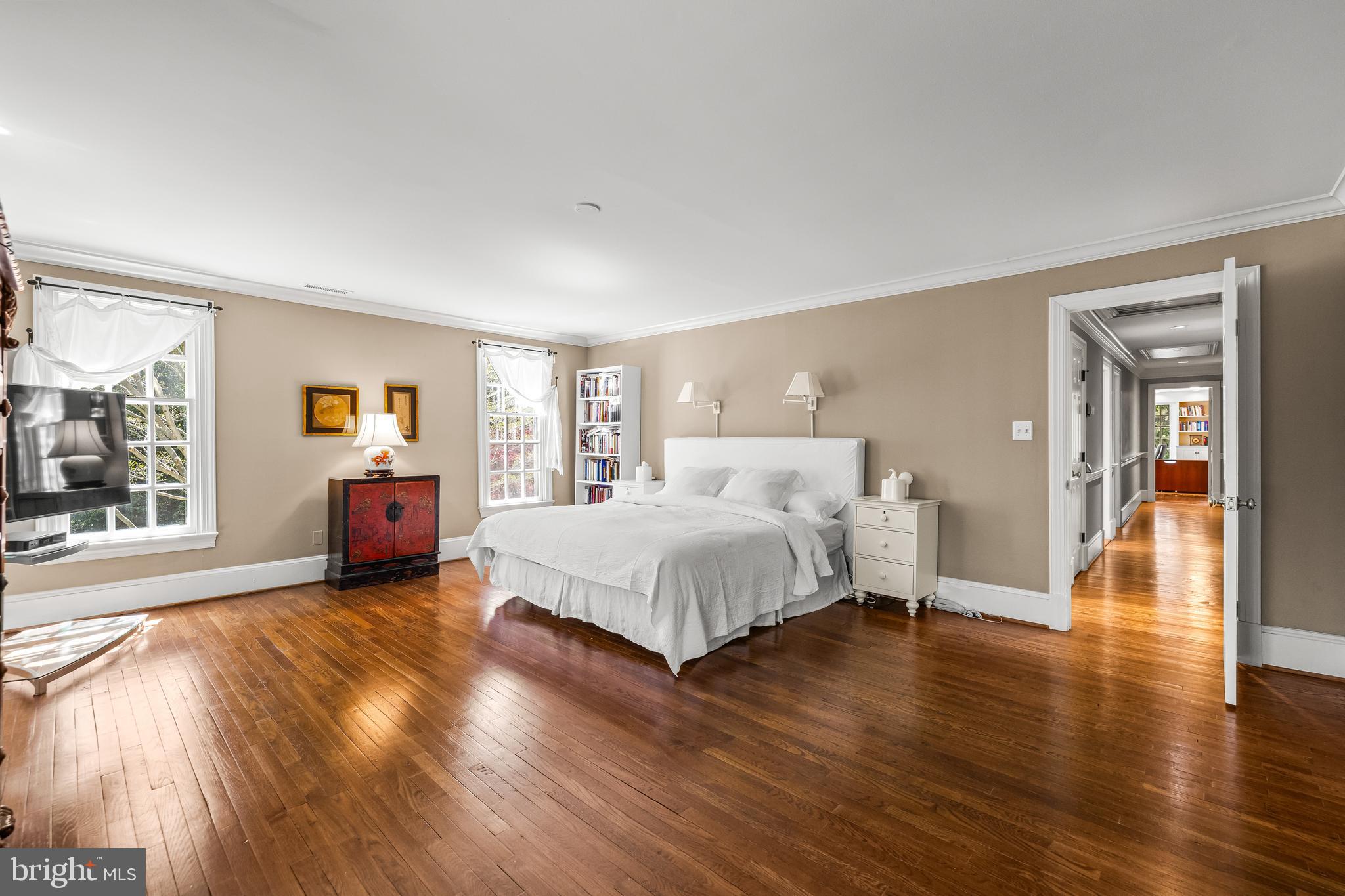 901 Chestnut Ridge Drive Lutherville-Timonium, MD 21093 - Photo 70 of 138 a spacious bedroom with a bed and wooden floor