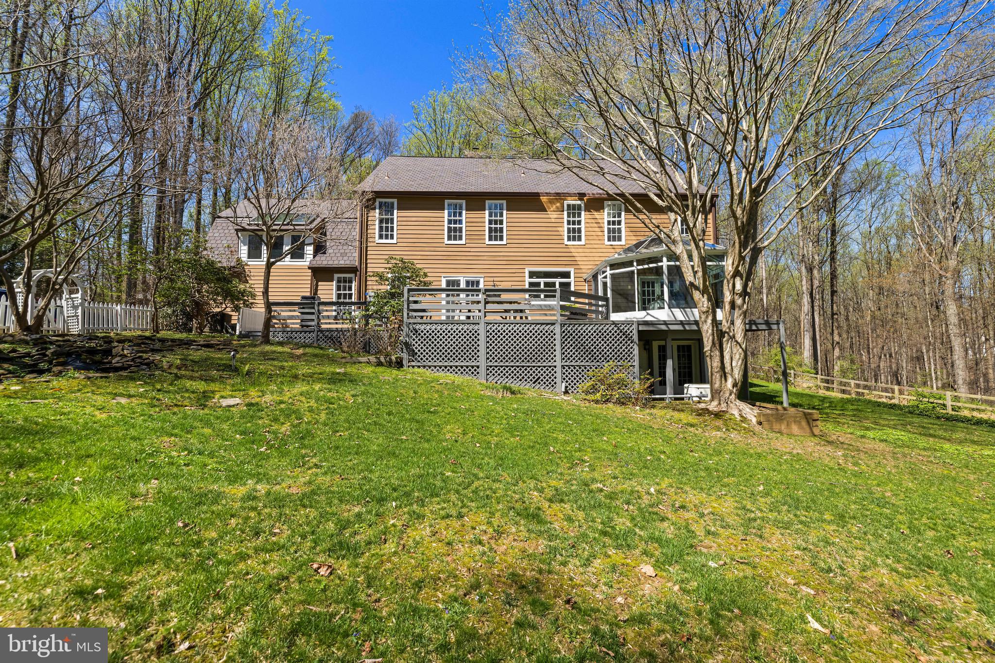 901 Chestnut Ridge Drive Lutherville-Timonium, MD 21093 - Photo 94 of 138 a front view of a house with a yard