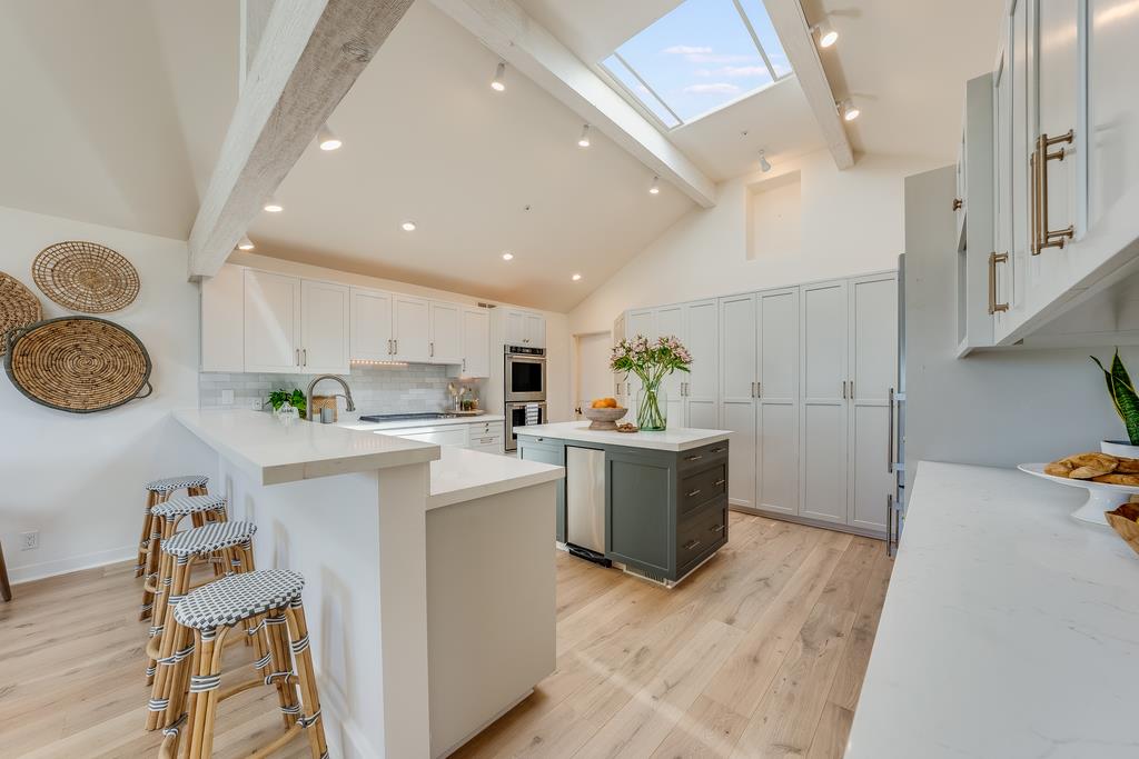 2863 Cuesta Way Carmel, CA 93923 - Photo 15 of 59 a kitchen with a sink and a stove top oven