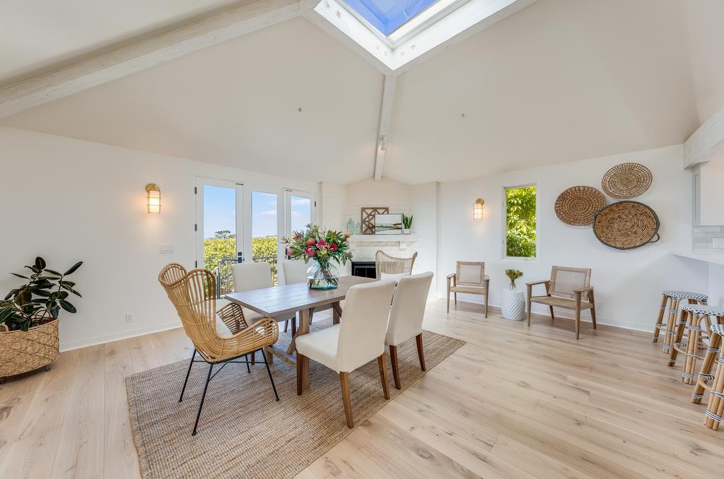 2863 Cuesta Way Carmel, CA 93923 - Photo 20 of 59 a view of a dining room with furniture and wooden floor
