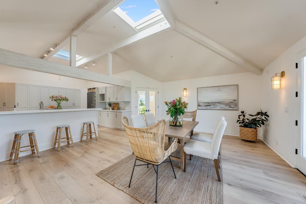 2863 Cuesta Way Carmel, CA 93923 - Photo 22 of 59 a view of a dining room with furniture and wooden floor