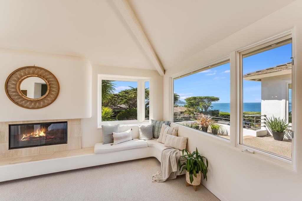 2863 Cuesta Way Carmel, CA 93923 - Photo 27 of 59 a living room with furniture and a fireplace