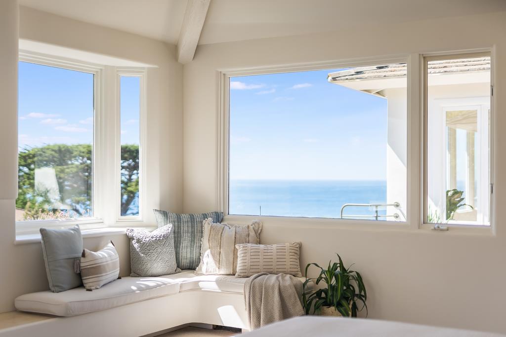 2863 Cuesta Way Carmel, CA 93923 - Photo 29 of 59 a living room with furniture and a large window