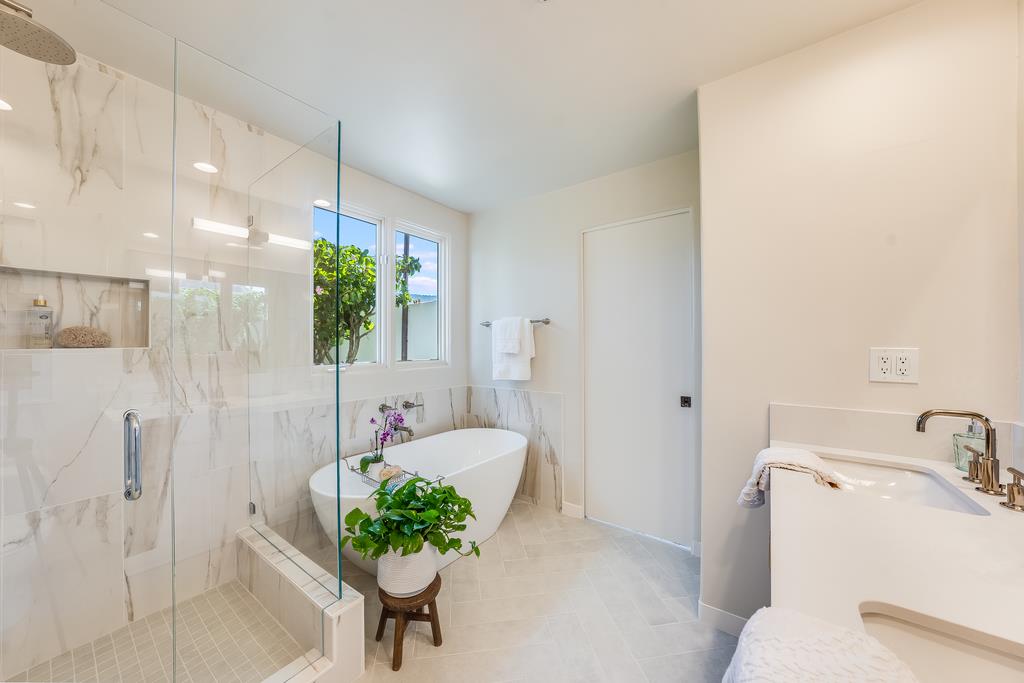 2863 Cuesta Way Carmel, CA 93923 - Photo 30 of 59 a bathroom with a sink mirror and shower