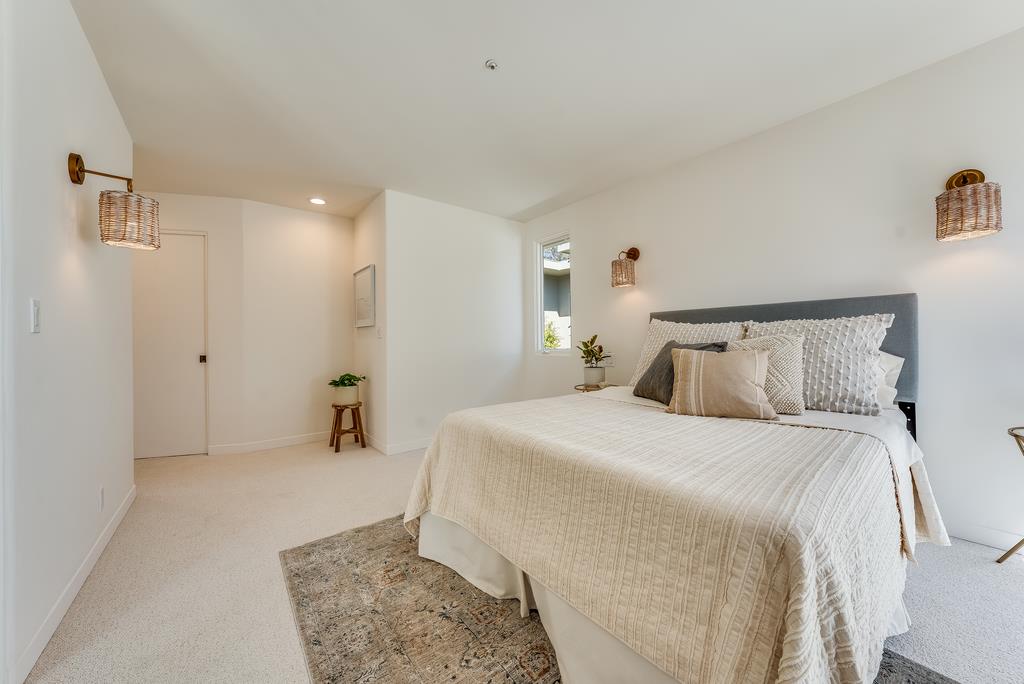 2863 Cuesta Way Carmel, CA 93923 - Photo 35 of 59 a bedroom with a bed and a refrigerator