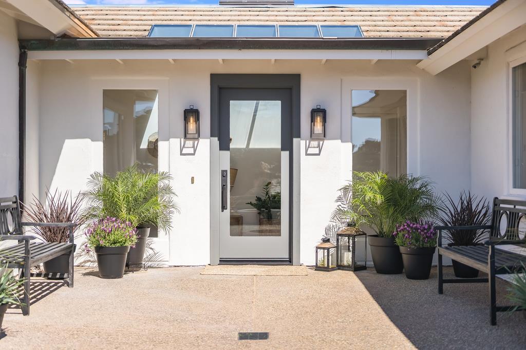 2863 Cuesta Way Carmel, CA 93923 - Photo 52 of 59 a potted plant sitting in front of a house