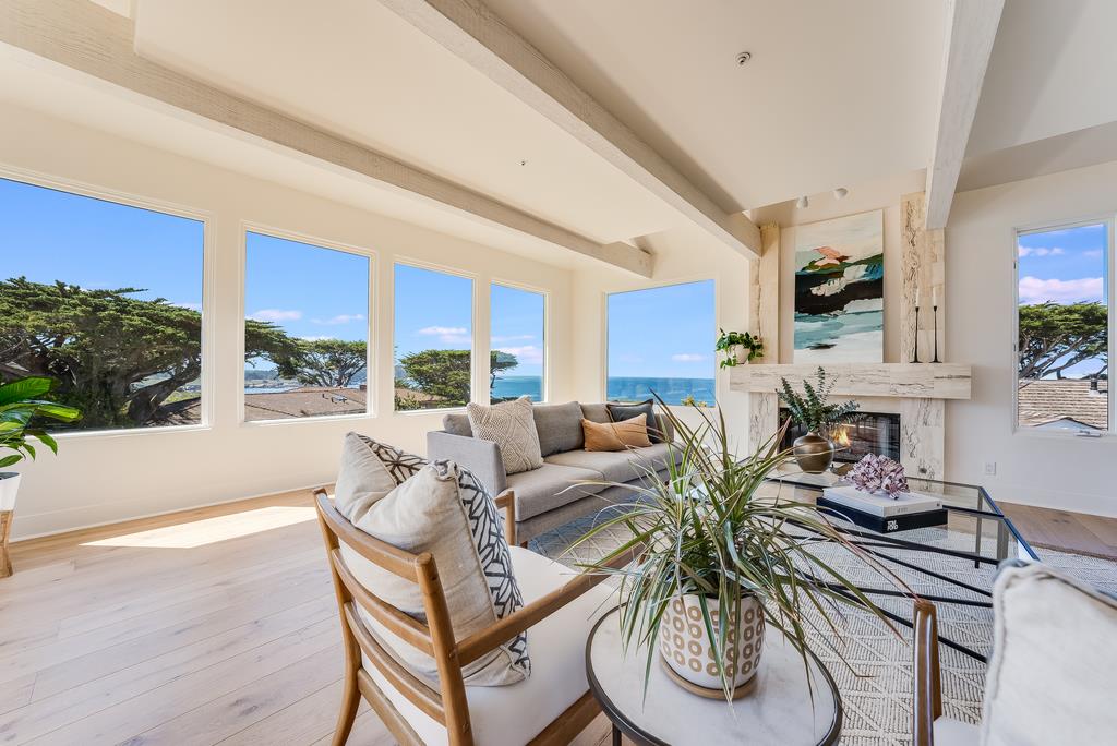 2863 Cuesta Way Carmel, CA 93923 - Photo 9 of 59 a living room with furniture a large window and a table