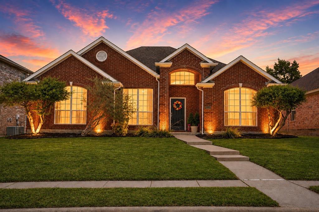 11414 Promenade Road Frisco, TX 75035 - Photo 1 of 24 Brick exterior with gabled roof lines