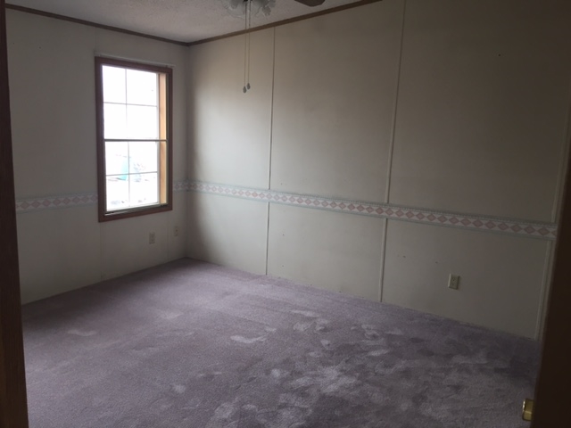 424 32 Road, Unit 148 Clifton, CO 81520 - Photo 16 of 26 an empty room with windows