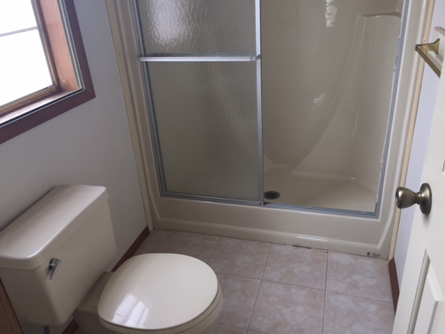 424 32 Road, Unit 148 Clifton, CO 81520 - Photo 19 of 26 a bathroom with a toilet and a shower