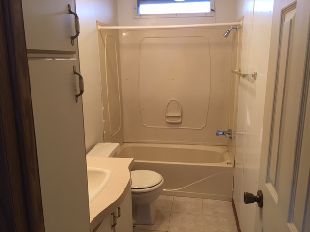 424 32 Road, Unit 148 Clifton, CO 81520 - Photo 21 of 26 a bathroom with a toilet and a shower