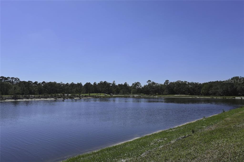 Undisclosed Address Lakewood Ranch, FL 34211 - Photo 16 of 28 a view of a lake and mountain view