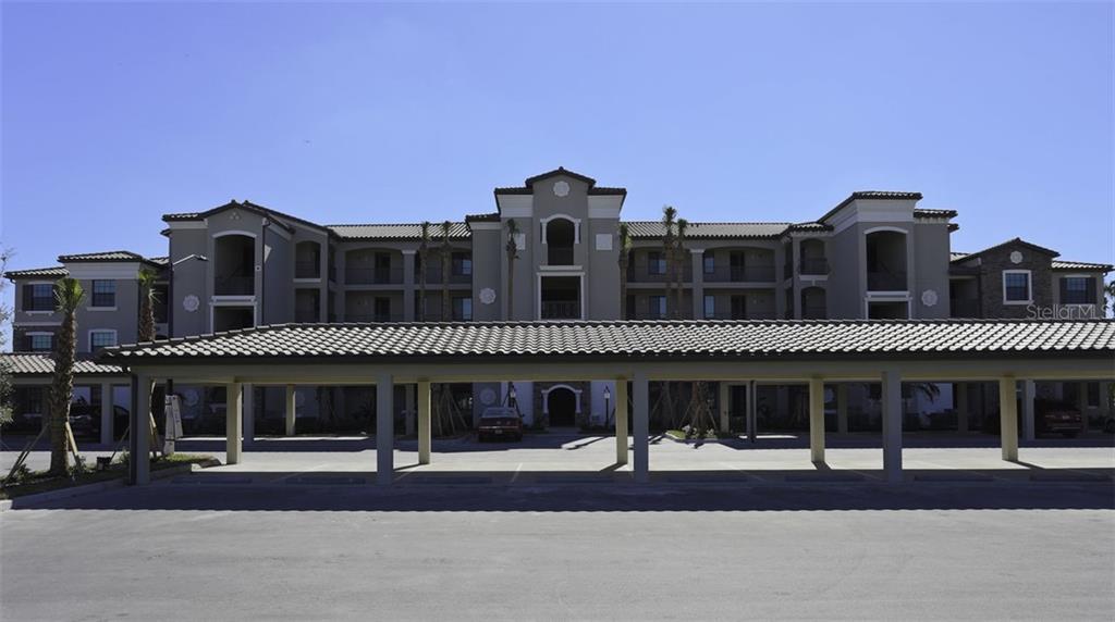 Undisclosed Address Lakewood Ranch, FL 34211 - Photo 2 of 28 a front view of a house