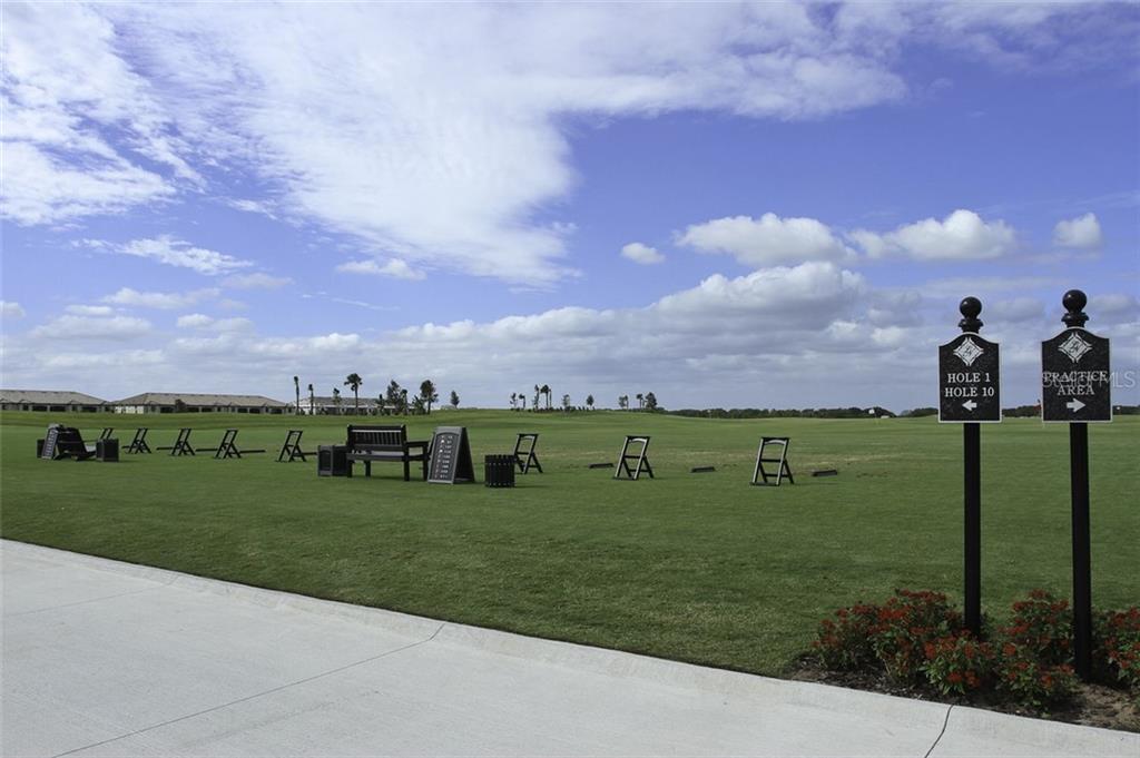 Undisclosed Address Lakewood Ranch, FL 34211 - Photo 25 of 28 a view of a golf course with a house