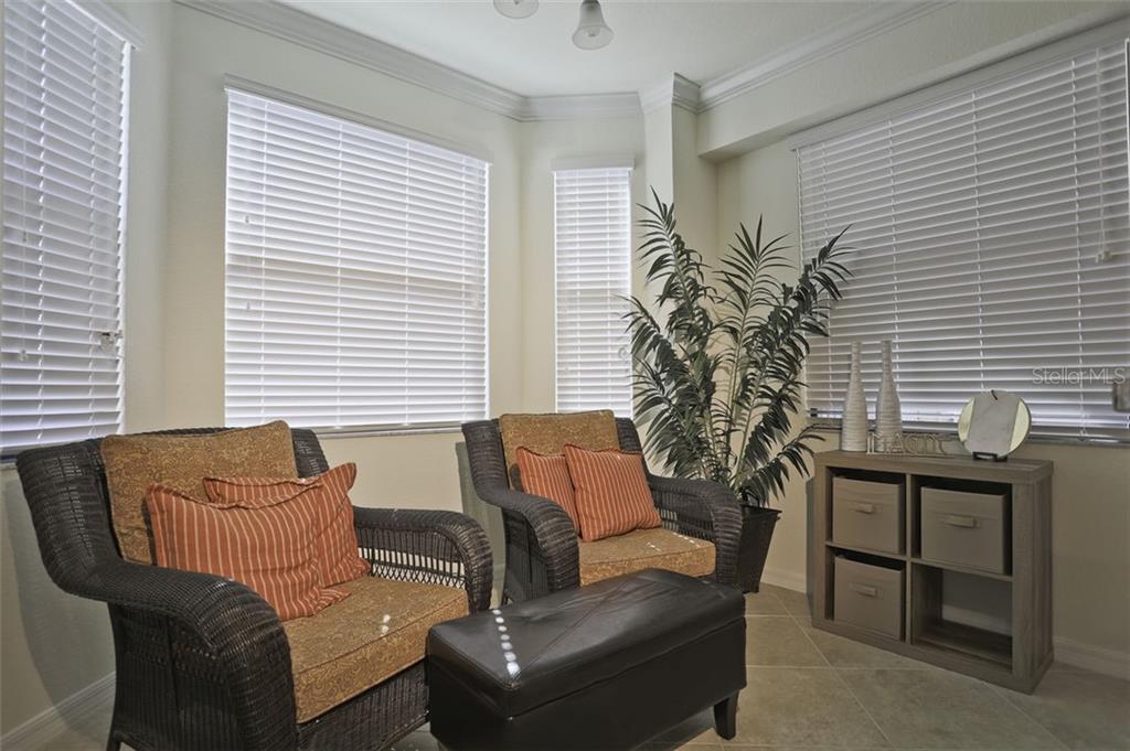 Undisclosed Address Lakewood Ranch, FL 34211 - Photo 8 of 28 a living room with furniture and a window