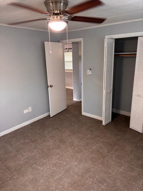 5392 Southeast 48th Avenue, Unit A Stuart, FL 34997 - Photo 10 of 12 a view of a big room with closet and wooden door