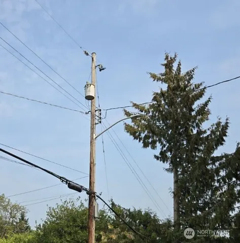 a vase of flowers sitting on a floor