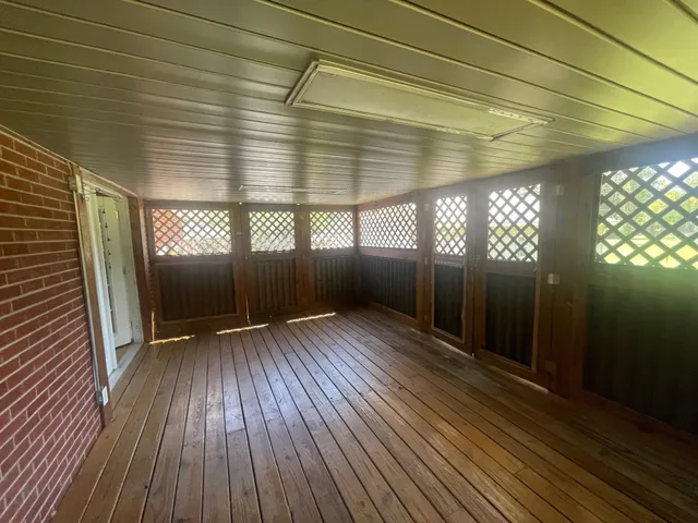 a bathroom with a toilet a sink and a shower