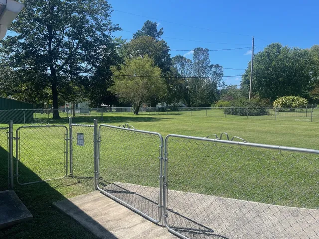 a view of a golf course with a lake