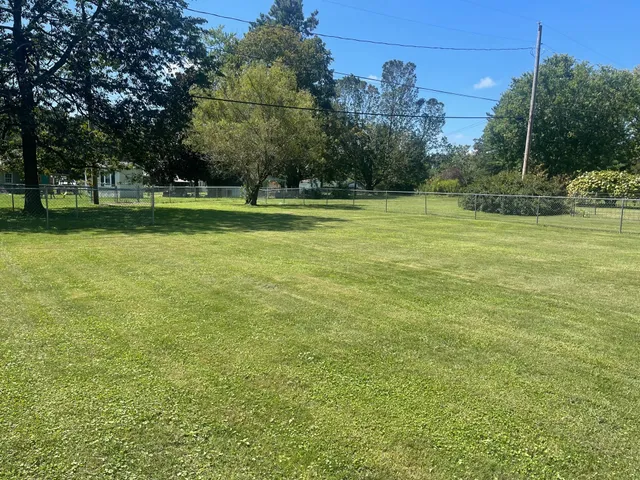 a front view of a house with garage