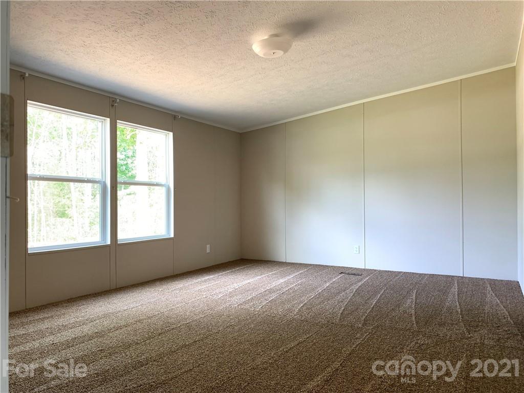 169 Mosley Road Blacksburg, SC 29702 - Photo 11 of 20 a view of an empty room with a window