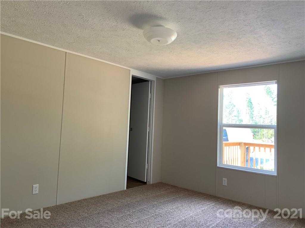 169 Mosley Road Blacksburg, SC 29702 - Photo 14 of 20 a view of an empty room with a window